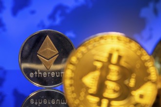 Cryptocurrencies: Close-up of a symbolic Bitcoin and Ethereum