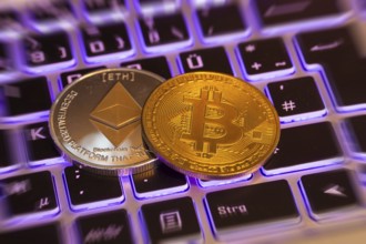 Cryptocurrencies: Close-up of a symbolic Bitcoin and Ethereum