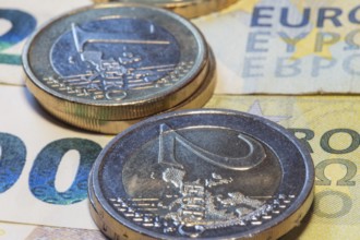 Close-up of euro banknotes and euro coins