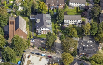 Aerial view, Lutherkirche am Martin-Luther-Platz und evang. Kindergarten Kita Lohberg, Lohberg,
