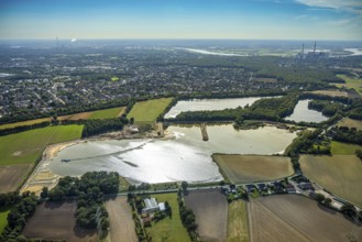 Aerial view, Schwarzer Weg quarry pond, view of Voerde and Voerde power station, Bruckhausen,