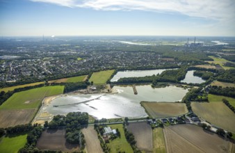 Aerial view, Schwarzer Weg quarry pond, view of Voerde and Voerde power station, Bruckhausen,
