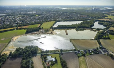 Aerial view, Schwarzer Weg quarry pond, view of Voerde and Voerde power station, Bruckhausen,