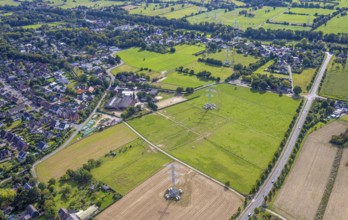 Aerial view, power line project with power pole construction for power line at Hammweg, Voerde,