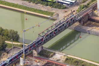 Aerial view, S-Bahn over a railway bridge Wesel-Datteln-Kanal, construction site and demolition of