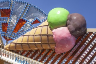 Ice cream cone with colourful ice cream scoops as decoration at the Bremer Osterwiese folk