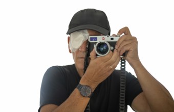 Portrait, self-portrait, selfie, photographer with eye bandage, eye injury, bandage on eye, looking