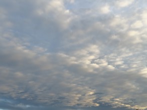 Bright altocumulus clouds Altocumulus clouds Cluster layer clouds under blue sky shortly in front