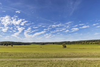 Pristine landscape in the Swabian Alb biosphere reserve with blue skies and small clouds. The