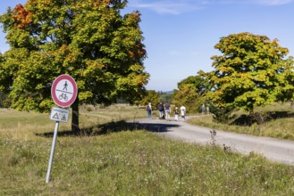 Hikers in the Swabian Alb biosphere reserve. The former military training area in Münsingen is an