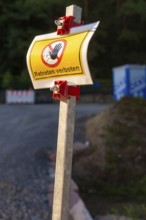 A warning sign with no trespassing on a construction site, Hermann Hessebahn construction site,