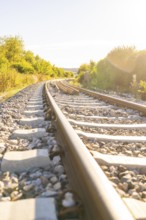 Tracks run in a curve through a picturesque landscape, Hermann Hessebahn construction site, Calw,