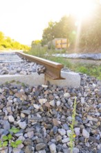 Close-up of a railway track in sunlight on ballast, Hermann Hessebahn construction site, Calw,