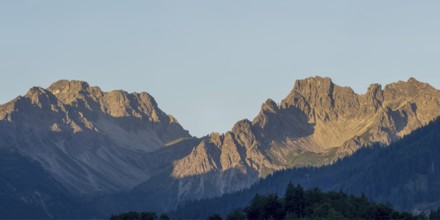 Mountain panorama at sunrise from Stillachtal into Warrmatsgundtal, on the left Alpgundkopf,