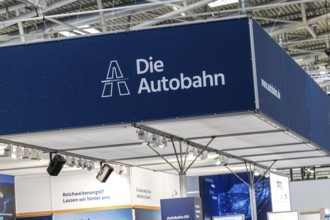 Exhibition stand Die Autobahn GmbH des Bundes. Logo and word mark. IAA MOBILITY in Munich. The