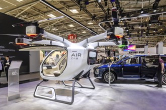 Exhibition stand of the Chinese manufacturer GAC, Guangzhou Automobile Group. Govy air taxi. Model