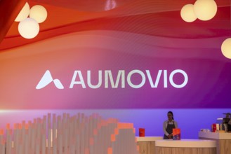 Exhibition stand of the company Aumovio. IAA MOBILITY in Munich. The motor show presents itself as