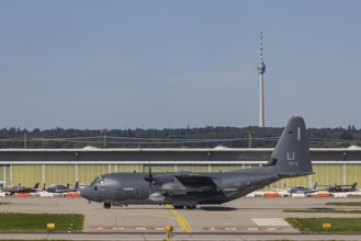 Stuttgart Airport with television tower and Lockheed L-100 Hercules aircraft of the US Air Force.