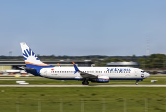 Stuttgart Airport with aircraft on the runway. Aircraft registration number: TC-SEP, SunExpress,