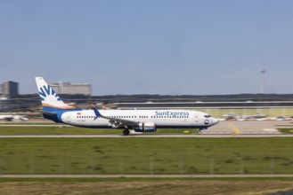 Stuttgart Airport with aircraft on the runway. Aircraft registration number: TC-SNT, SunExpress,