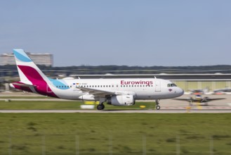 Stuttgart Airport with aircraft on the runway. Aircraft registration number: D-AGWV, Eurowings,