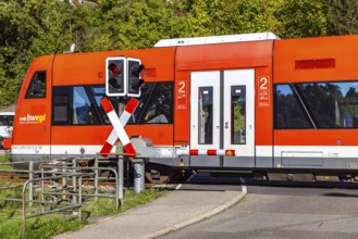 Level crossing at Nagold station with DB Regio railcars. The train is travelling on behalf of the