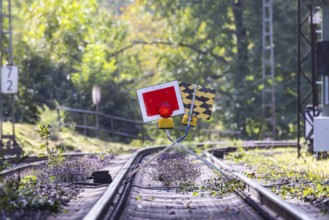 Track closed. The signal is called Sh2 (protective stop) . The stop sign is placed in front of