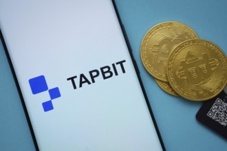 Dhaka, Bangladesh - 20 Sep 2025: The logo of Tapbit is displayed on a smartphone screen