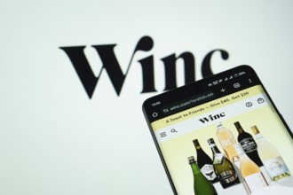 Dhaka, Bangladesh- 03 July 2025: Smartphone displaying Winc web interface against Winc logo