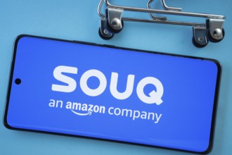 Dhaka, Bangladesh- 03 July 2025: Smartphone screen showing the Souq logo with shopping cart wheels