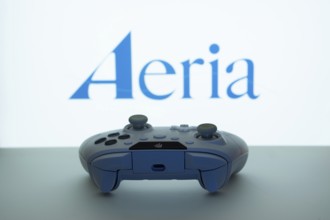 Dhaka, Bangladesh- 23 Sep 2025: Game controller in front of Aeria logo on a background