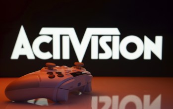 Dhaka, Bangladesh- 23 Sep 2025: Game controller in front of Activision logo on a background