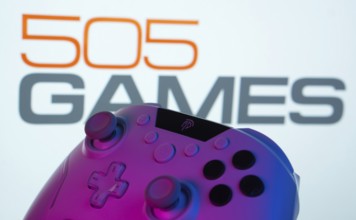 Dhaka, Bangladesh- 23 Sep 2025: A close-up of a gamepad with the 505 Games seen on screen in the