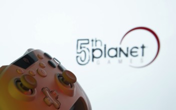 Dhaka, Bangladesh- 23 Sep 2025: A close-up of a gamepad with the 5th planet games seen on screen in