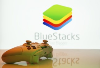 Dhaka, Bangladesh- 23 Sep 2025: Game controller in front of BlueStacks logo on a background