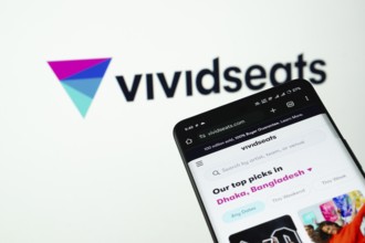 Dhaka, Bangladesh- 03 July 2025: Smartphone displaying VividSeats web interface against (....) logo