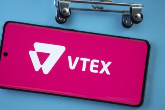 Dhaka, Bangladesh- 03 July 2025: Smartphone screen showing the VTEX logo with shopping cart wheels