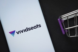 Dhaka, Bangladesh- 03 July 2025: A smartphone displaying the VividSeats logo next to a miniature