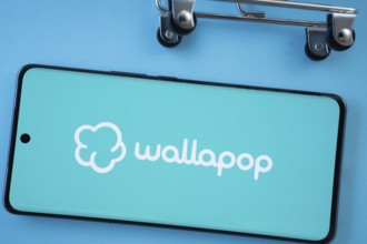 Dhaka, Bangladesh- 03 July 2025: Smartphone screen showing the Wallapop logo with shopping cart