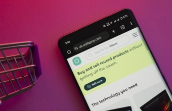 Dhaka, Bangladesh- 23 June 2025: A smartphone displaying the Wallapop website with a shopping cart