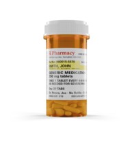 Generic medication prescription medicine bottle and pills isolated on a white background. the label