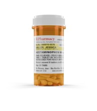Acetaminophen prescription medicine bottle and pills isolated on a white background. the label is