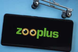 Dhaka, Bangladesh- 03 July 2025: Smartphone screen showing the zooplus logo with shopping cart