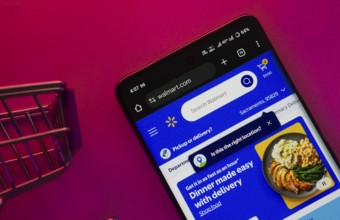 Dhaka, Bangladesh- 23 June 2025: A smartphone displaying the Walmart website with a shopping cart