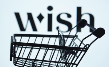 Dhaka, Bangladesh- 03 July 2025: Silhouette of a shopping cart in front of the Wish logo,