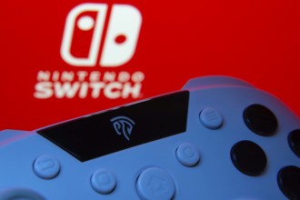 Dhaka, Bangladesh- 15 July 2025: A close-up of a gamepad with thenintendo switch seen on screen in