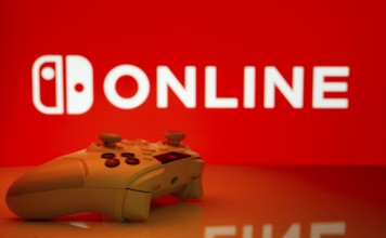 Dhaka, Bangladesh- 15 July 2025: Game controller in front of nintendo online logo on a background