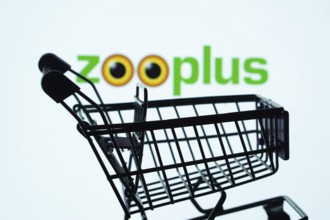 Dhaka, Bangladesh- 03 July 2025: Silhouette of a shopping cart in front of the zooplus logo,