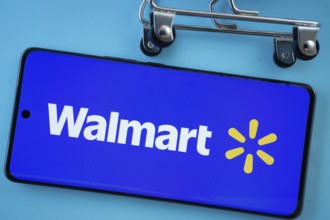 Dhaka, Bangladesh- 03 July 2025: Smartphone screen showing the Walmart logo with shopping cart