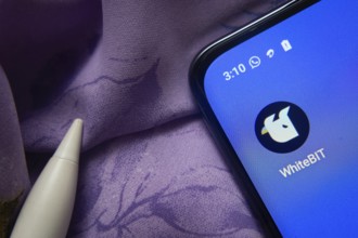 Dhaka, Bangladesh- 07 May 2025: whitebit app icon is seen on smartphone